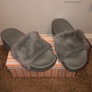 Grey fur platform slides
